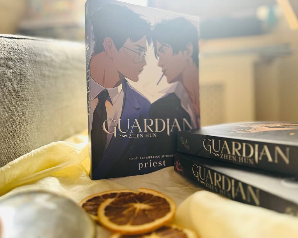 Image of Guardian novels with some dried orange slices in front