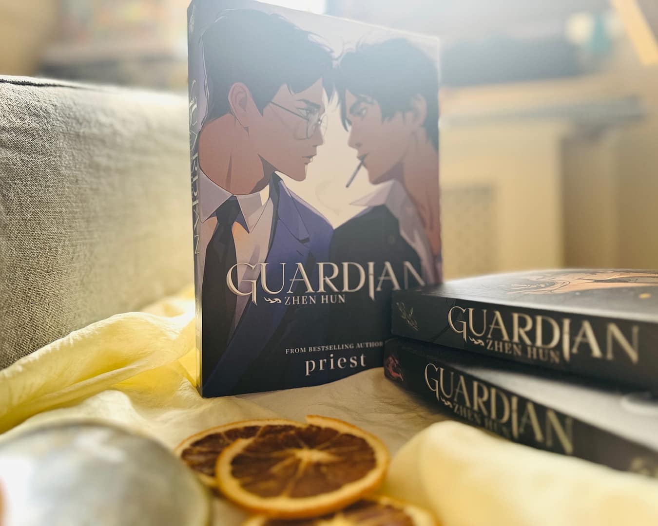 Image of Guardian novels with some dried orange slices in front