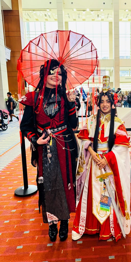 Xie Lian and Hua Cheng cosplayers at Otakon 2025