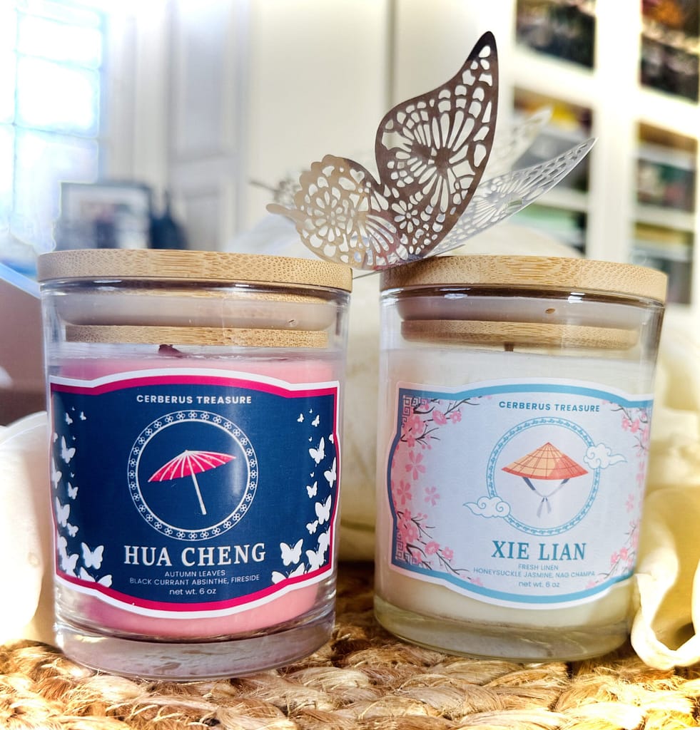 Hua Cheng and Xie Lian canndles with butterfly on top